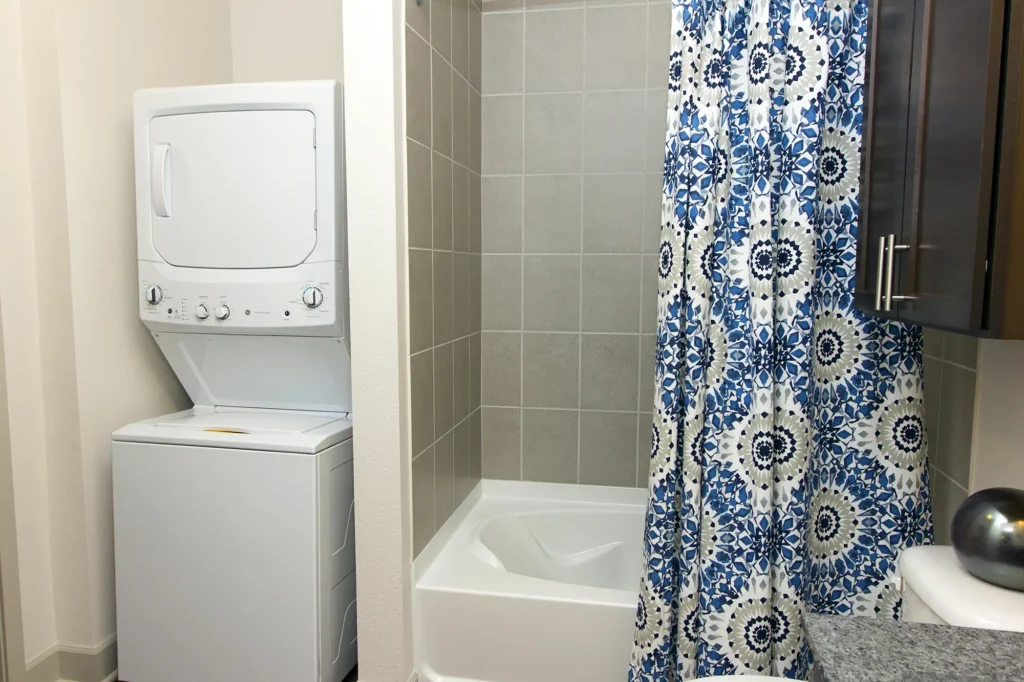 Bathroom with washer and dryer